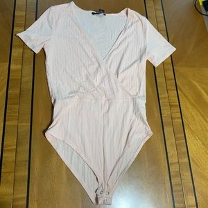 NWT blush pink knit bodysuit